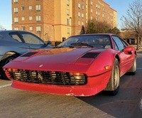 23597